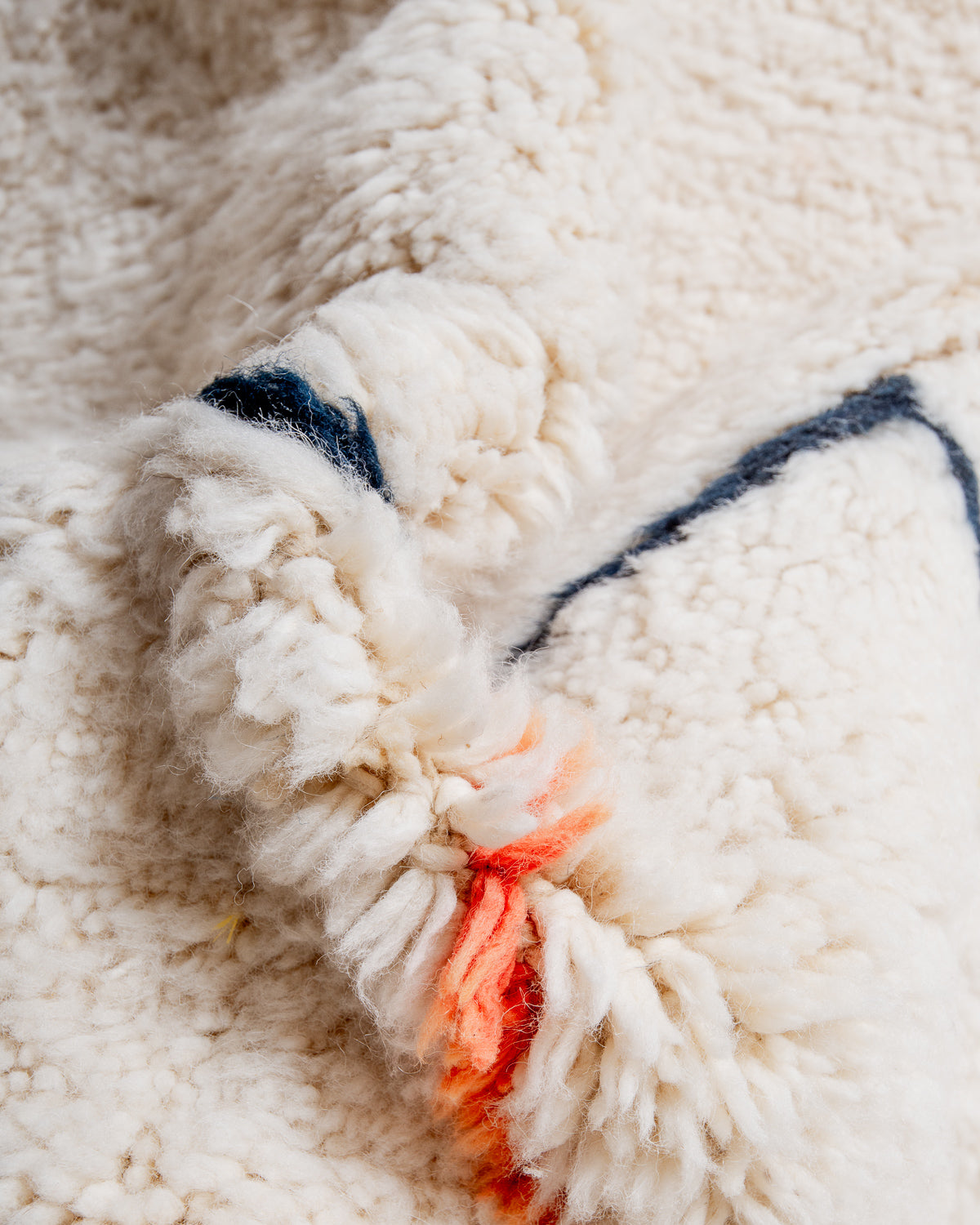 Modern, designer, handcrafted Berber rug from Morocco. Beniourain carpet with beautiful colours and patterns and fluffy wool texture.